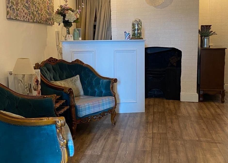 Elegant seating area at Movement Clinics, Loughborough, England, GB, featuring vintage decor.