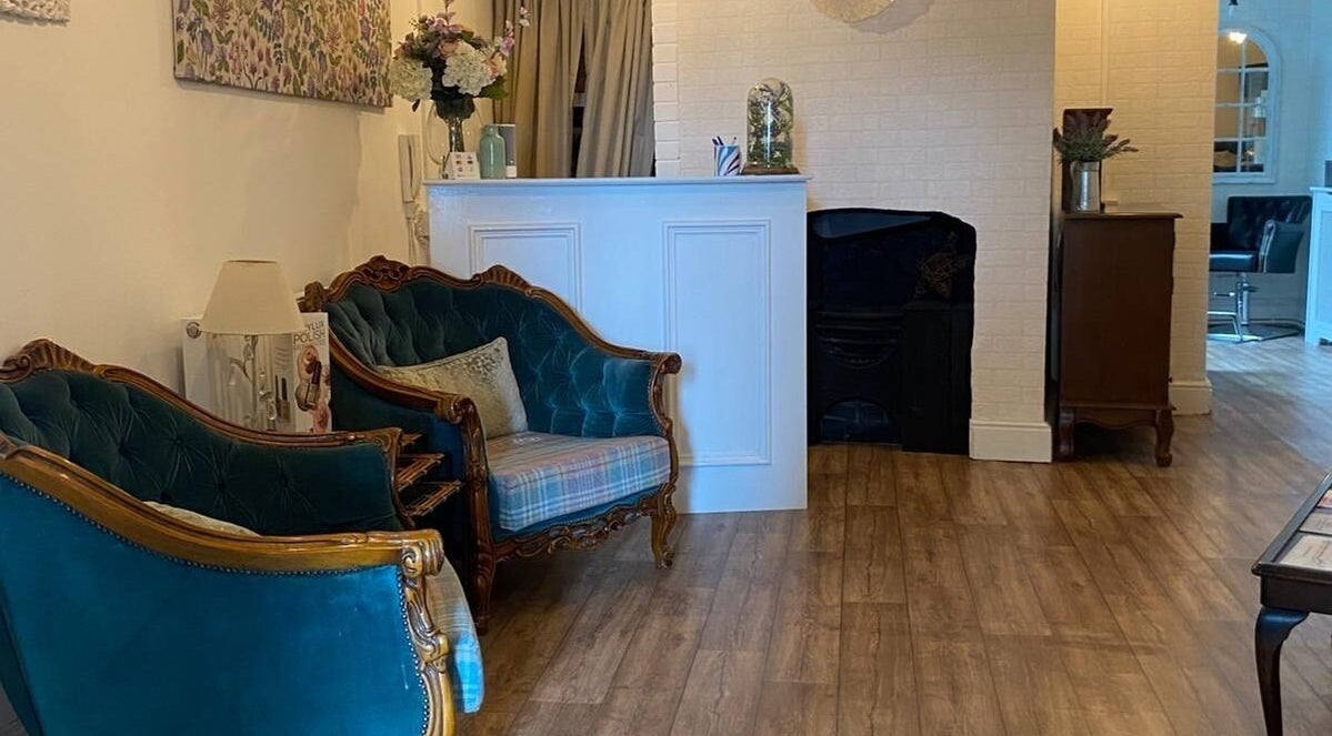 Elegant seating area at Movement Clinics, Loughborough, England, GB, featuring vintage decor.