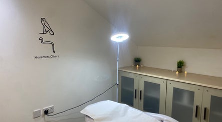 Tranquil treatment room at Movement Clinics Leicester, England, GB, with soft lighting and minimal decor.