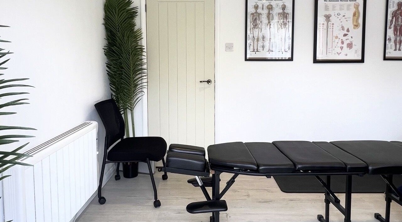 Modern therapy room with sleek adjustment table at Align n' Thryve Chiropractic Clinic, Witchford, England, GB.