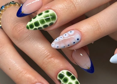 Intricate nail art at Kállos Nails in Fort Lauderdale, Florida, US showcasing unique designs.