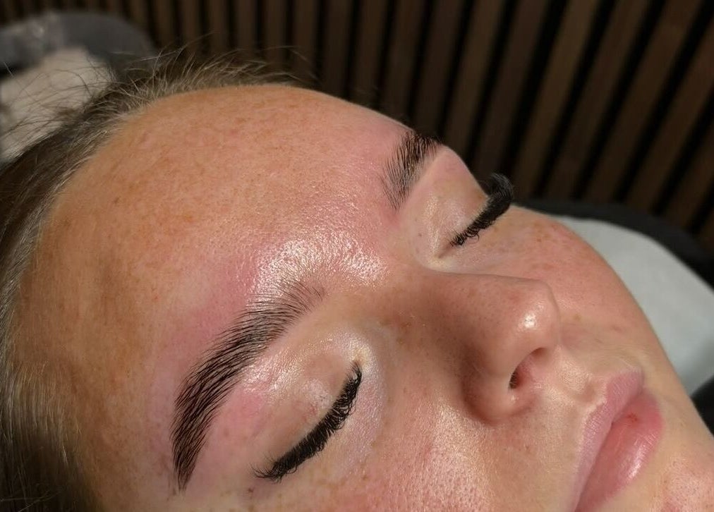 Eyebrow treatment at byzayleigh, Hinckley, England, GB showcasing perfect arches and smooth skin.