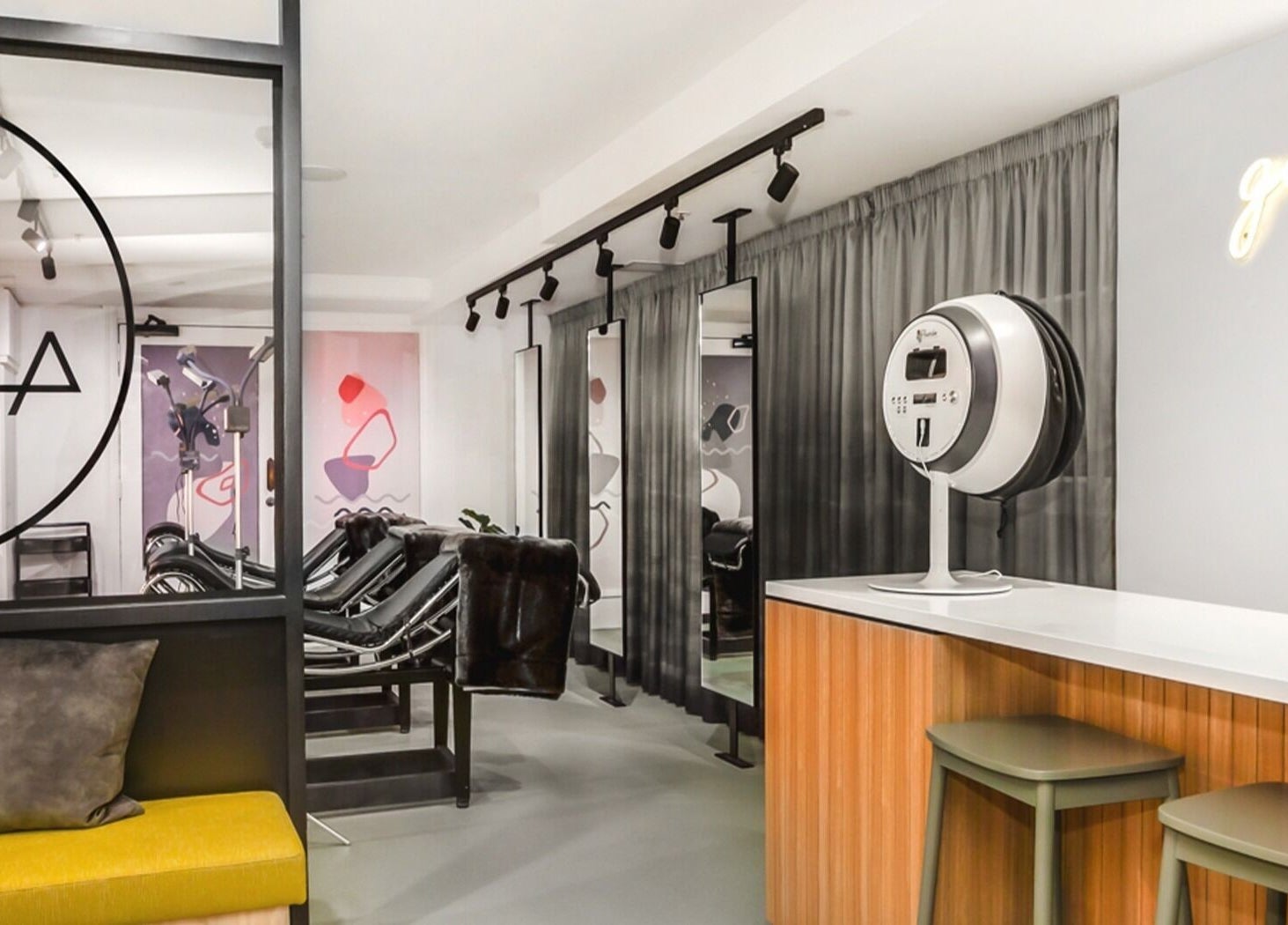 Modern interior of Skintopia - Old Bank Arcade, Wellington, NZ, featuring sleek beauty stations and stylish decor.