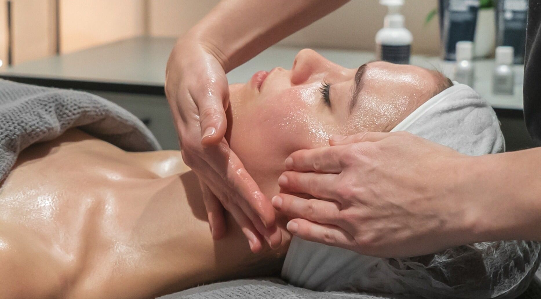 Facial massage at Skintopia - Milford, Auckland, Auckland, NZ enhancing relaxation and glowing skin.