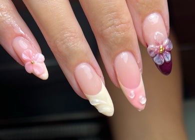 Floral nail art by Thebeautyroom in Bulkington, England, GB, showcasing detailed flower accents.