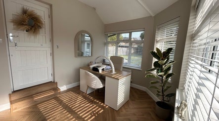Bright, minimalist nail station at The Nail Room at Epsom Downs, Epsom, England, GB, with natural light.