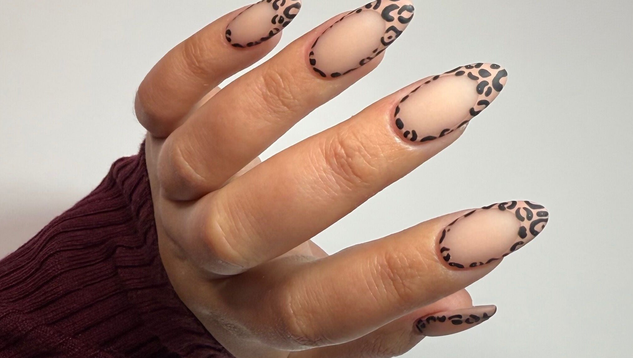 Chic leopard print nail art by MF Nail Artist, Rustenburg, North West, ZA. Stylish and creative manicure design.