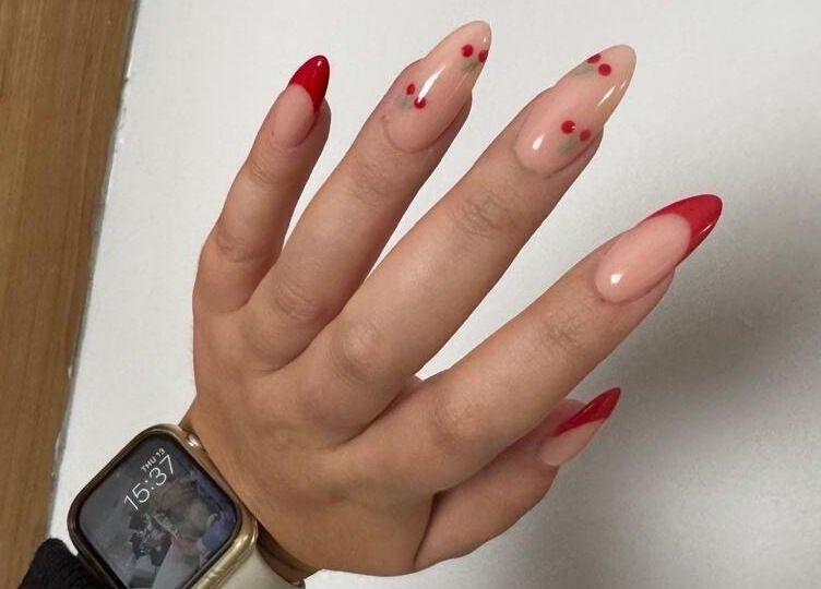 Elegant red-tipped nails designed by MF Nail Artist in Rustenburg, North West, ZA, exemplifying unique style.