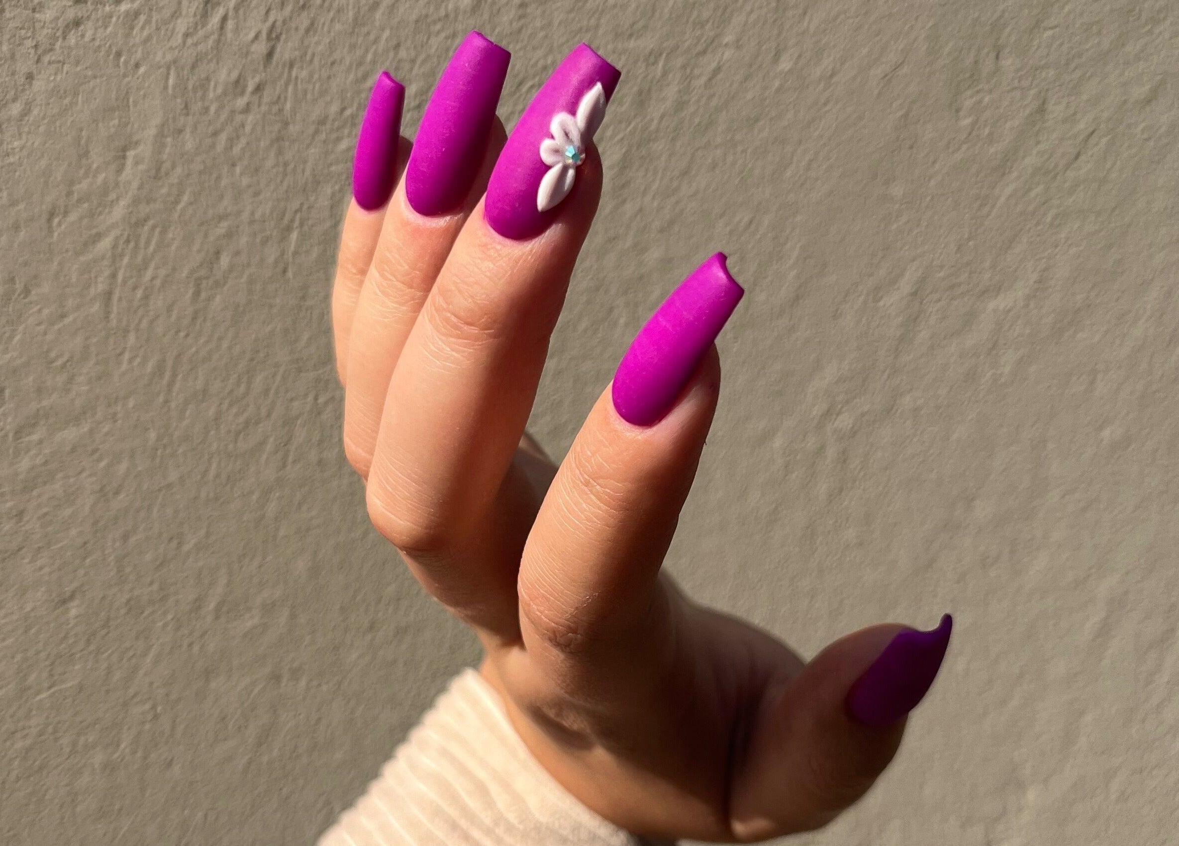 Vibrant plum nails with floral accent designed at MF Nail Artist, Rustenburg, North West, ZA.