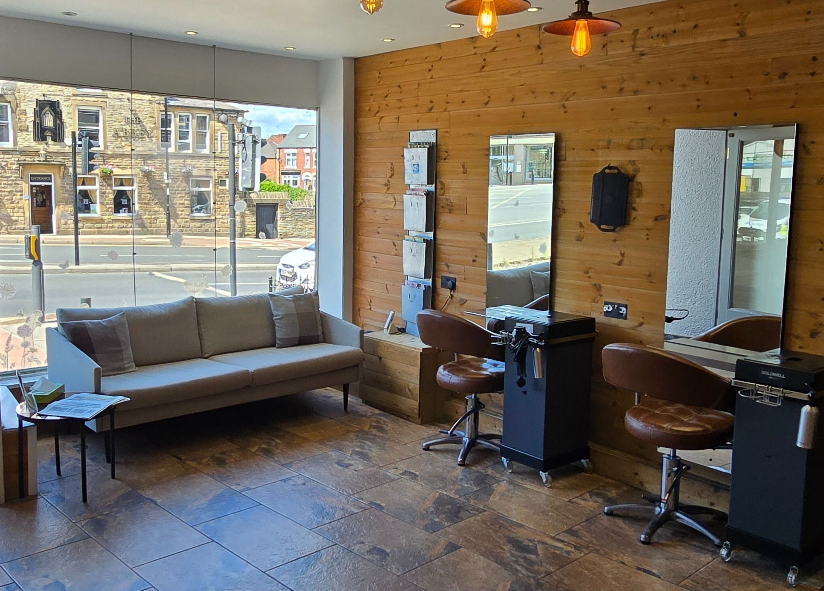 Cozy salon seating and mirrors at Hype Woodseats, Sheffield, England, GB.