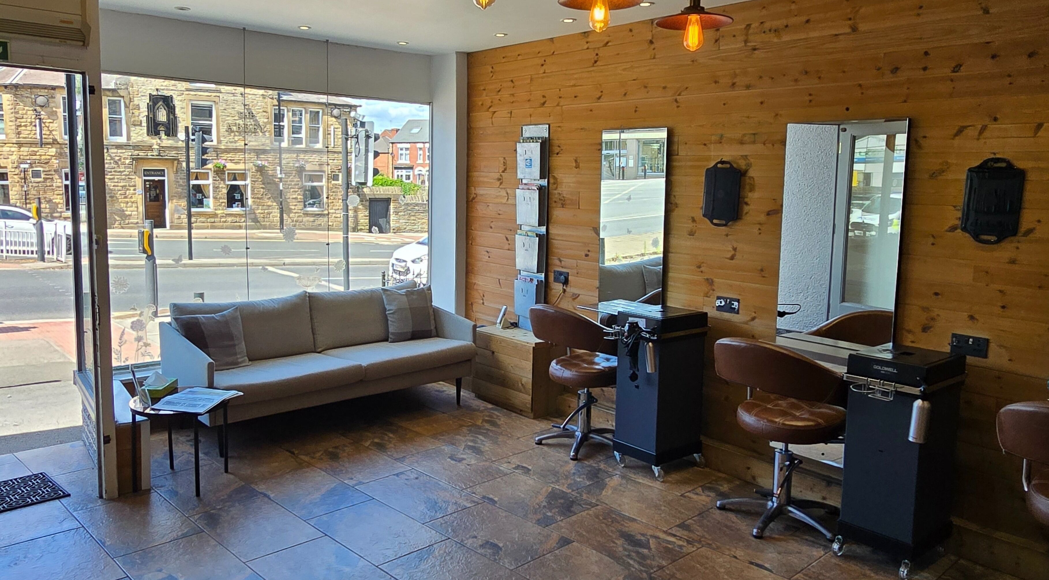 Cozy salon seating and mirrors at Hype Woodseats, Sheffield, England, GB.