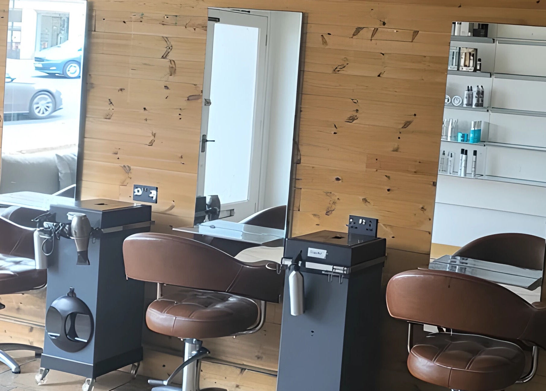 Hype Woodseats salon stations with mirrors and chairs in Sheffield, England, GB.