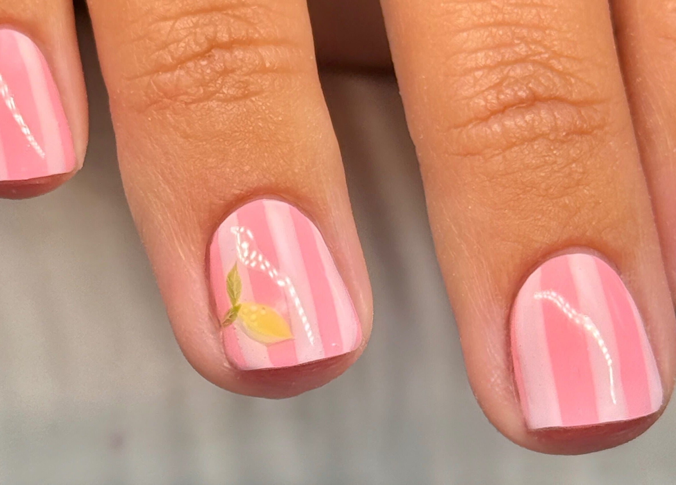 Pink nail art with lemon accent at Nailsby Georgia, Saint Helens, England, GB.