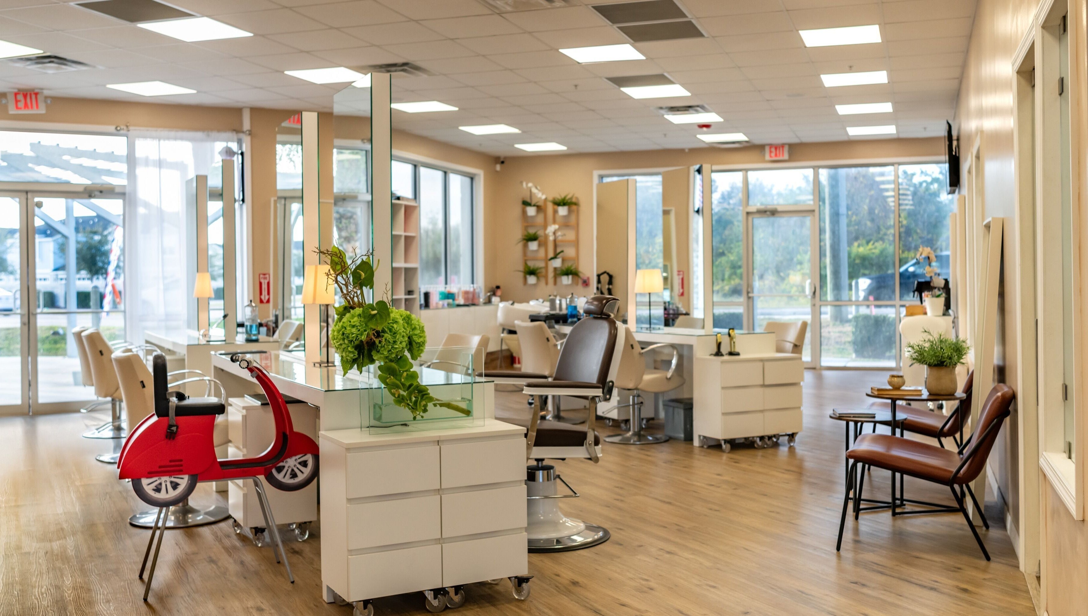 Spacious, modern beauty salon interior at Jacques Janine, Orlando, Florida, US, featuring stylish decor and seating.