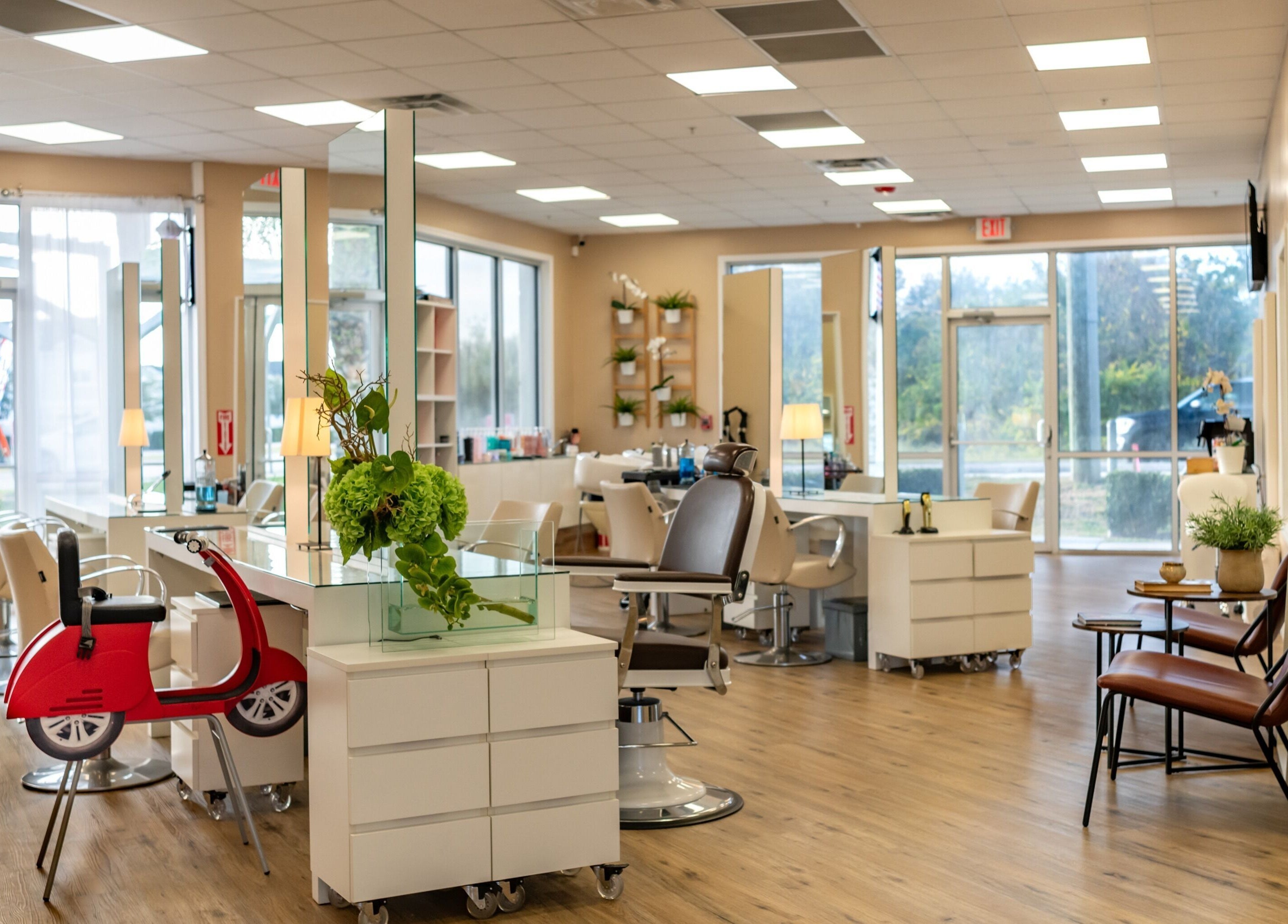 Spacious, modern beauty salon interior at Jacques Janine, Orlando, Florida, US, featuring stylish decor and seating.
