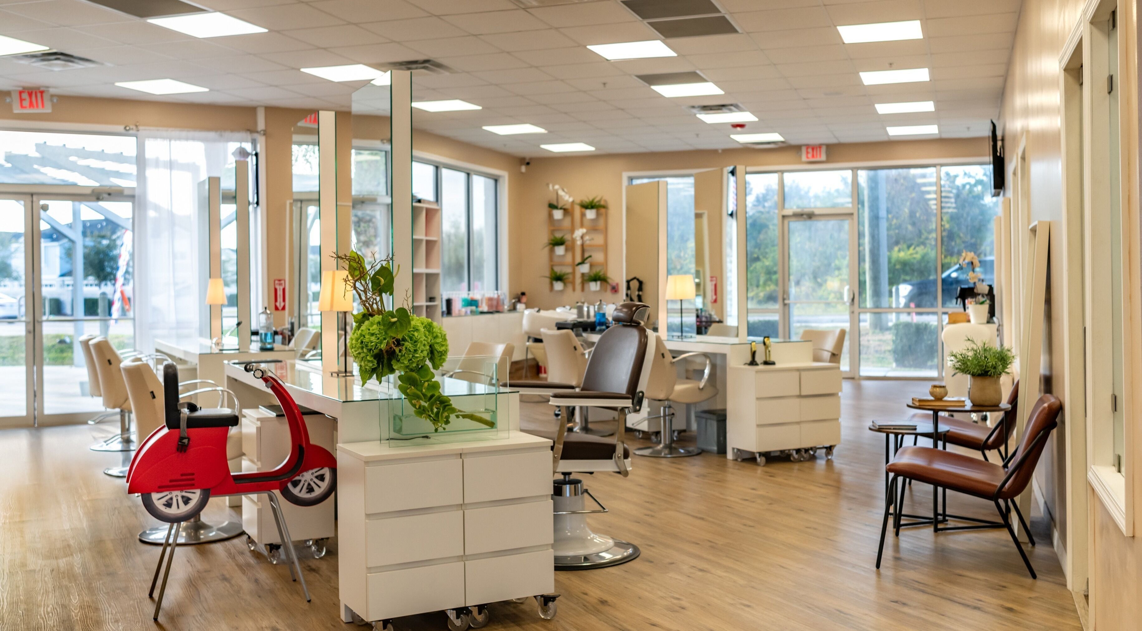 Spacious, modern beauty salon interior at Jacques Janine, Orlando, Florida, US, featuring stylish decor and seating.