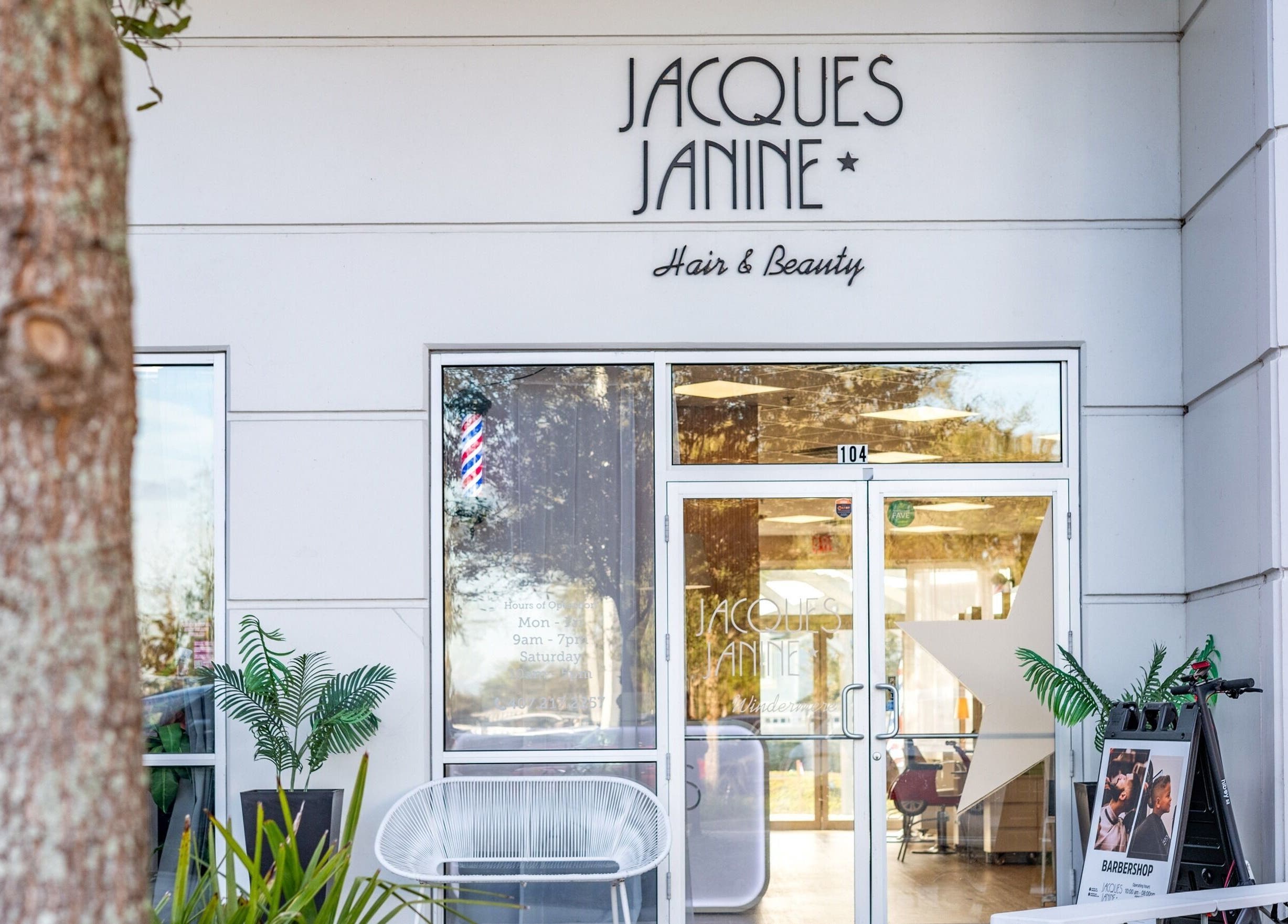 Entrance of Jacques Janine beauty salon in Orlando, Florida, US with plants and a welcoming facade.