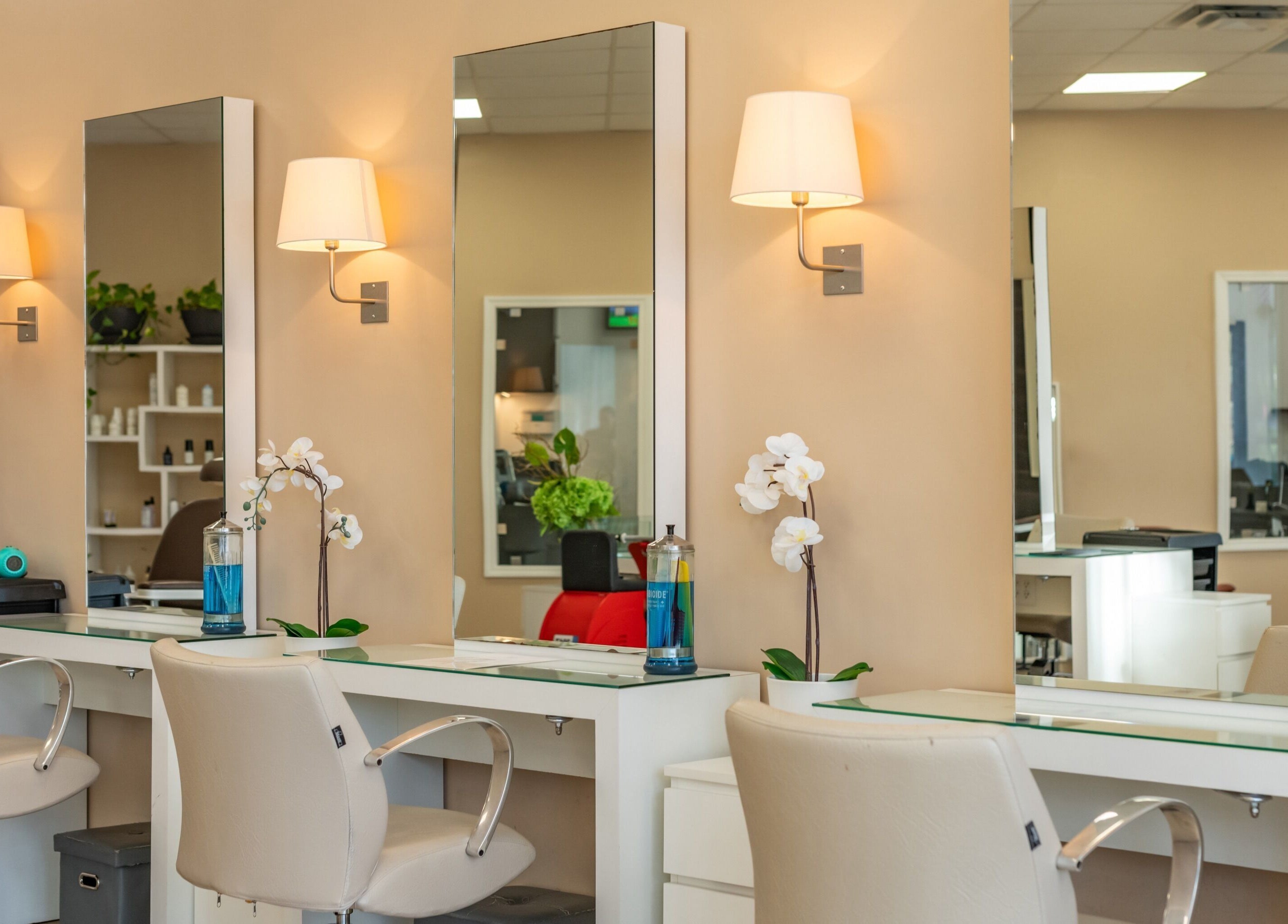 Chic interior of Jacques Janine beauty salon in Orlando, Florida, US with stylish chairs and mirrors.