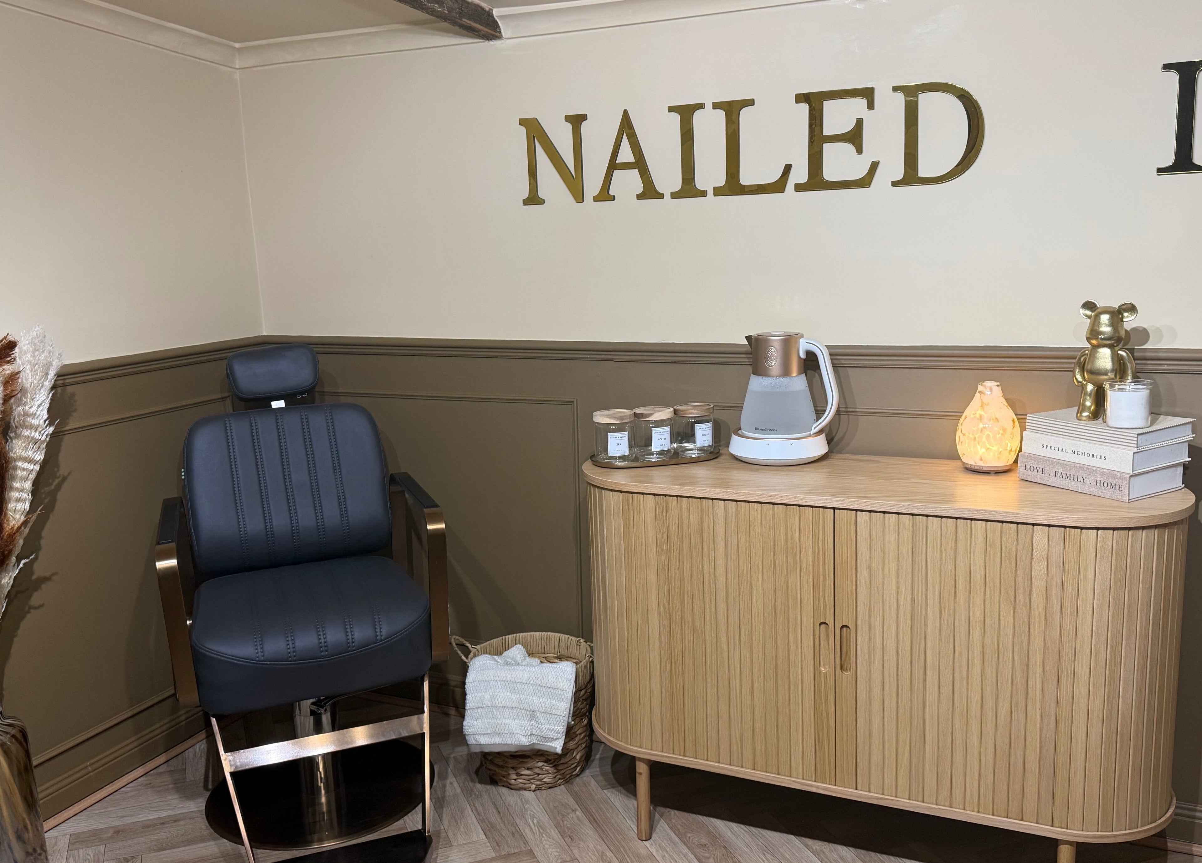 Elegant spa setup at Nailed It by Victoria in Pelsall, England, GB with plush chair and soothing decor.