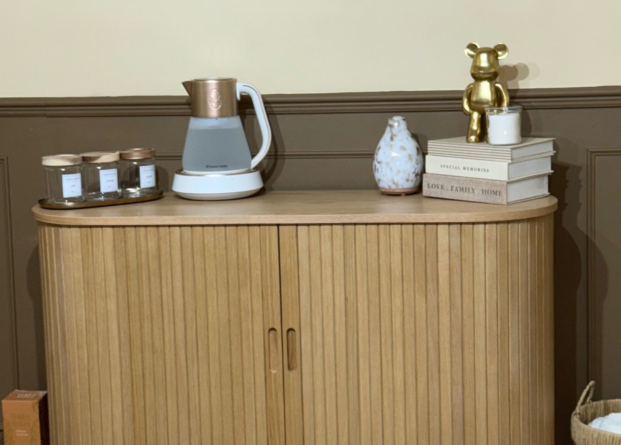 Elegant wooden cabinet with decor at Nailed It by Victoria, Pelsall, England, GB enhancing the tranquil ambiance.