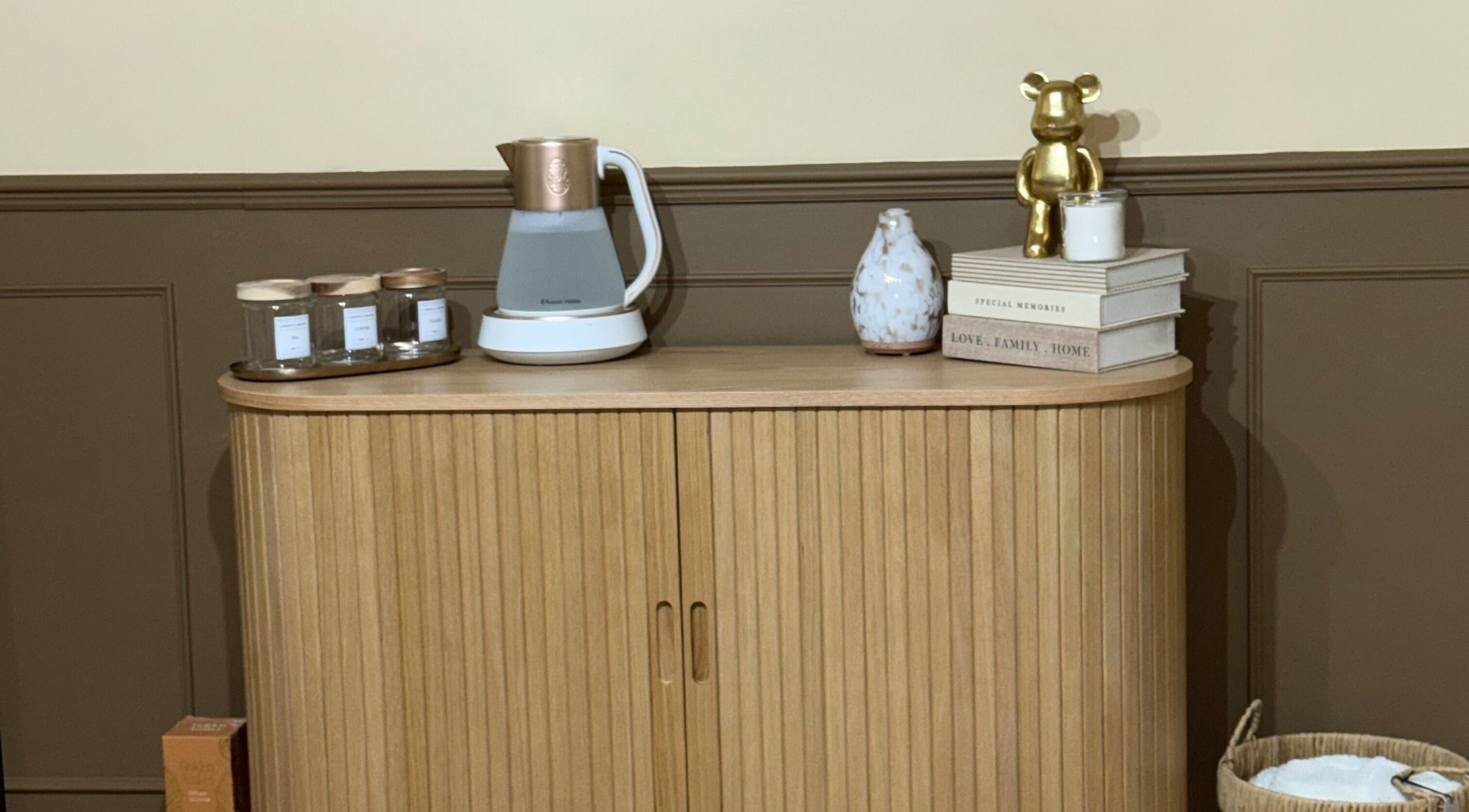 Elegant wooden cabinet with decor at Nailed It by Victoria, Pelsall, England, GB enhancing the tranquil ambiance.