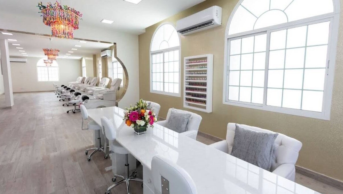 Spacious interior of Hadeelita Beauty Lounge, مسقط, محافظة مسقط, OM with stylish decor and comfortable seating.