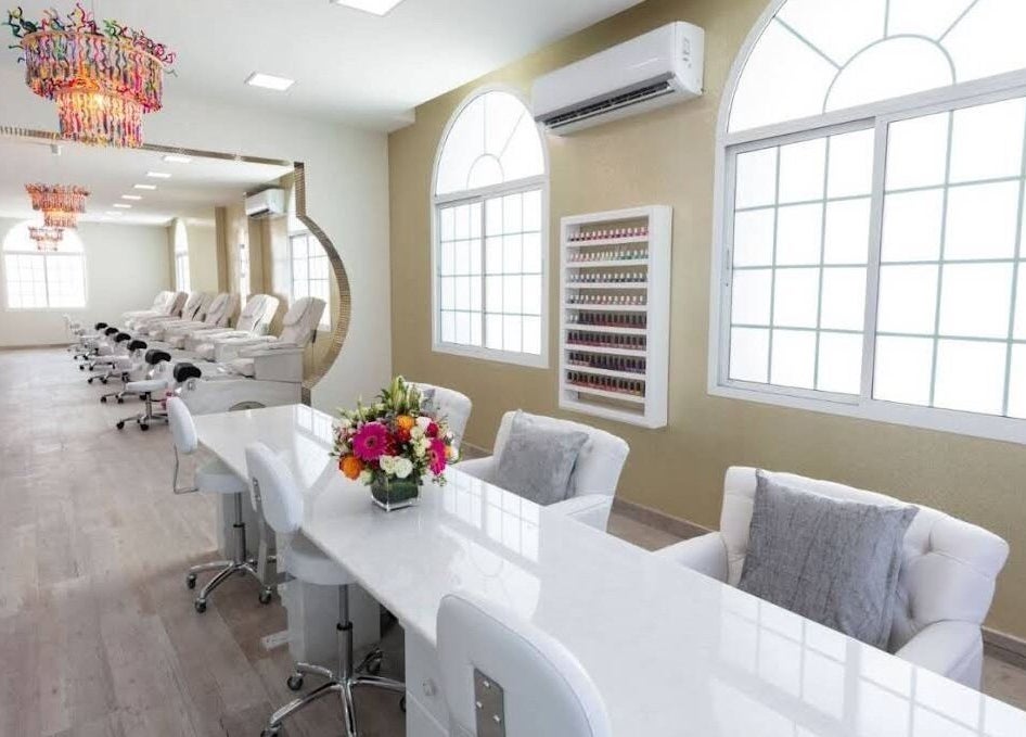 Spacious interior of Hadeelita Beauty Lounge, مسقط, محافظة مسقط, OM with stylish decor and comfortable seating.