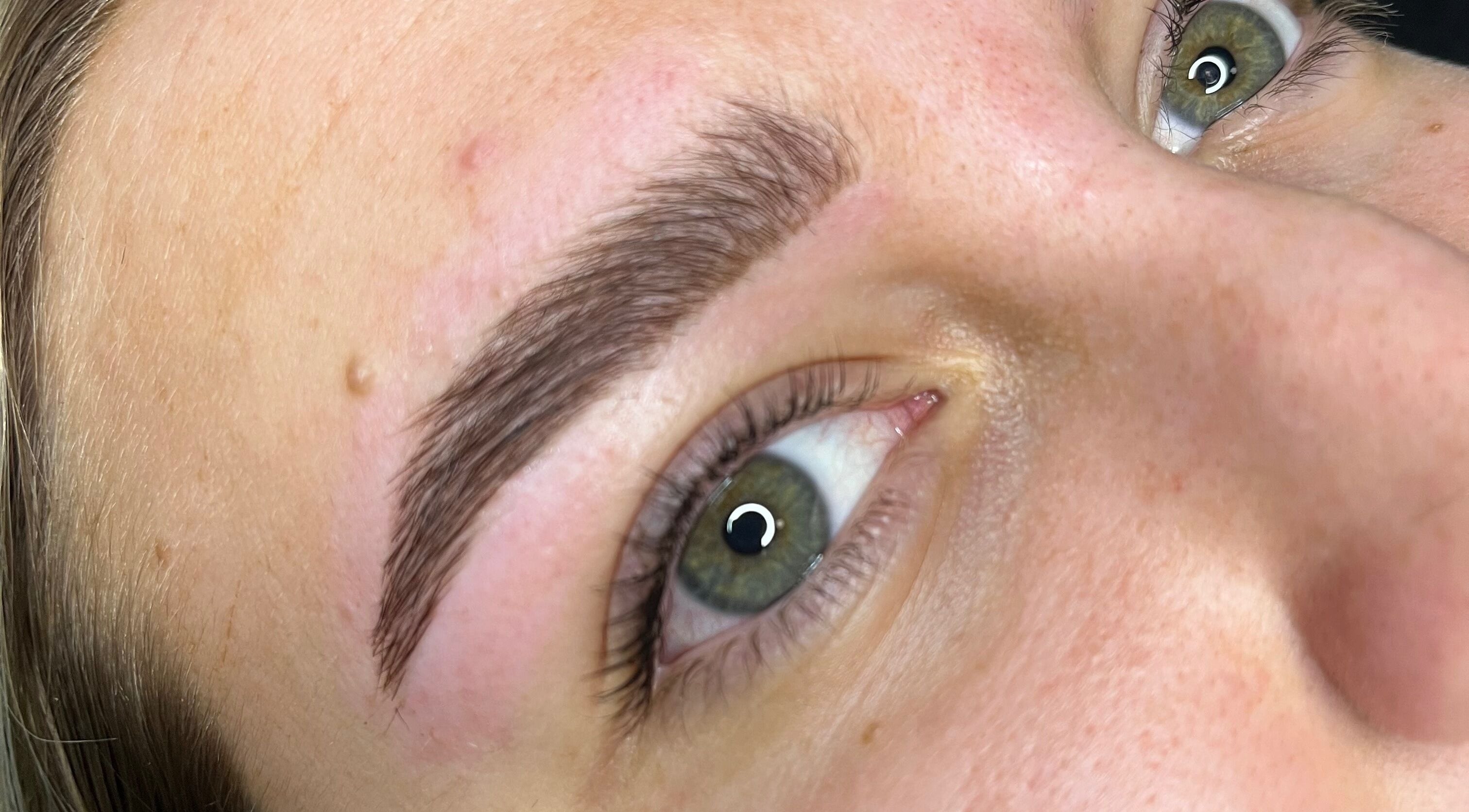 Close-up of perfectly shaped eyebrows at Cosmetics By Jess, Petersfield, England, GB.