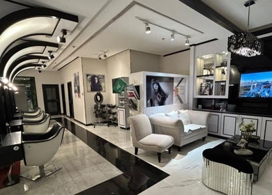 Interior of Bokla Salon & Spa in Al Khobar, Eastern Province, SA, featuring sleek salon chairs and modern decor.