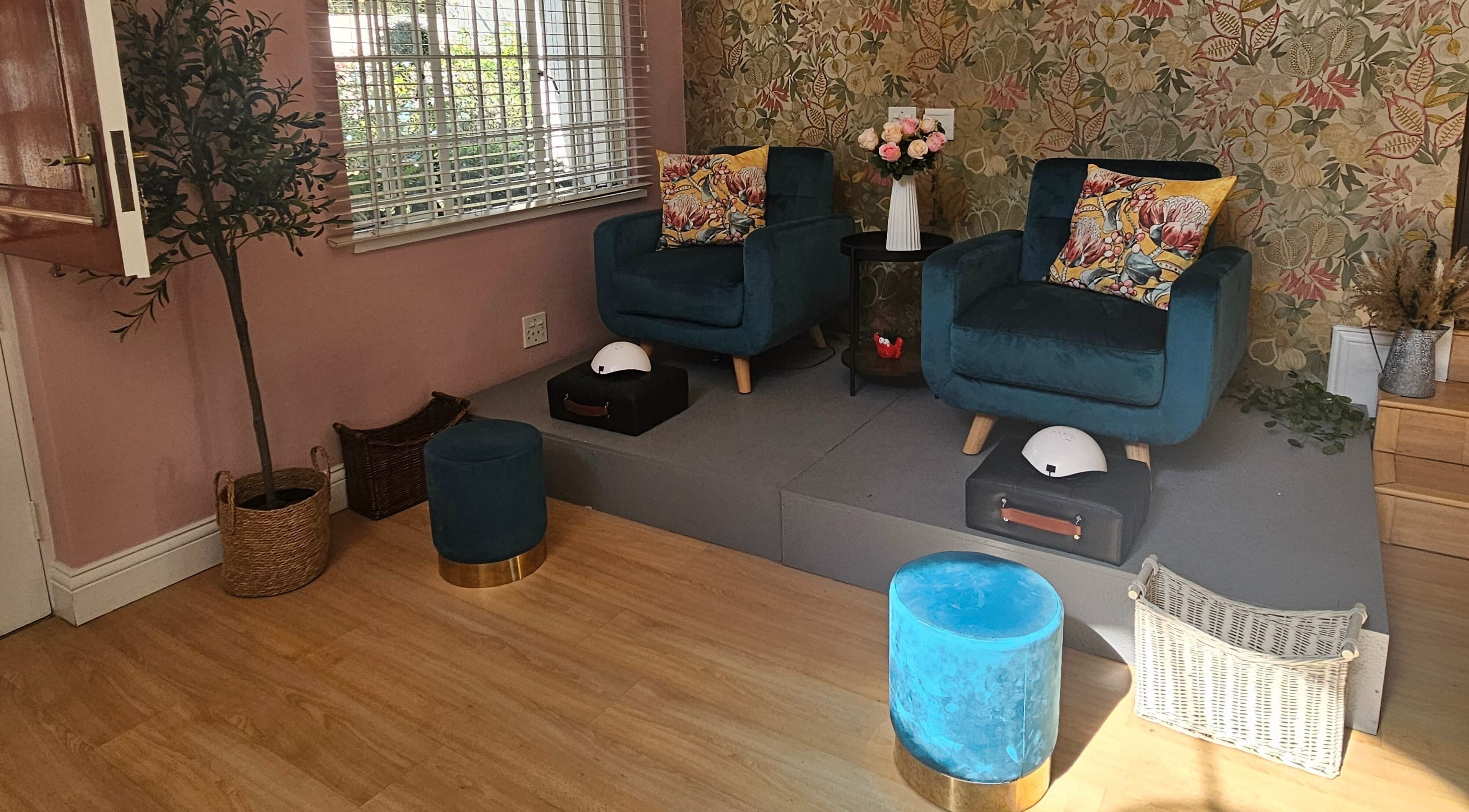 Cozy seating at The Nail Garden Bryanston-JHB, Sandton, Gauteng, ZA, with chic decor and plush chairs.