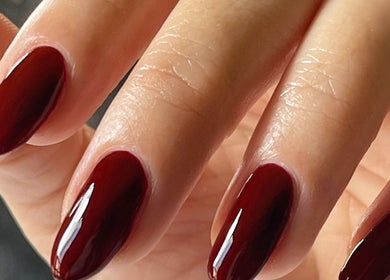 Elegant crimson nails at Refresh Skin and Body, Salisbury, England, GB, showcasing expert manicure services.