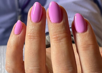 Close-up of pink manicured nails at Refresh Skin and Body, Salisbury, England, GB.