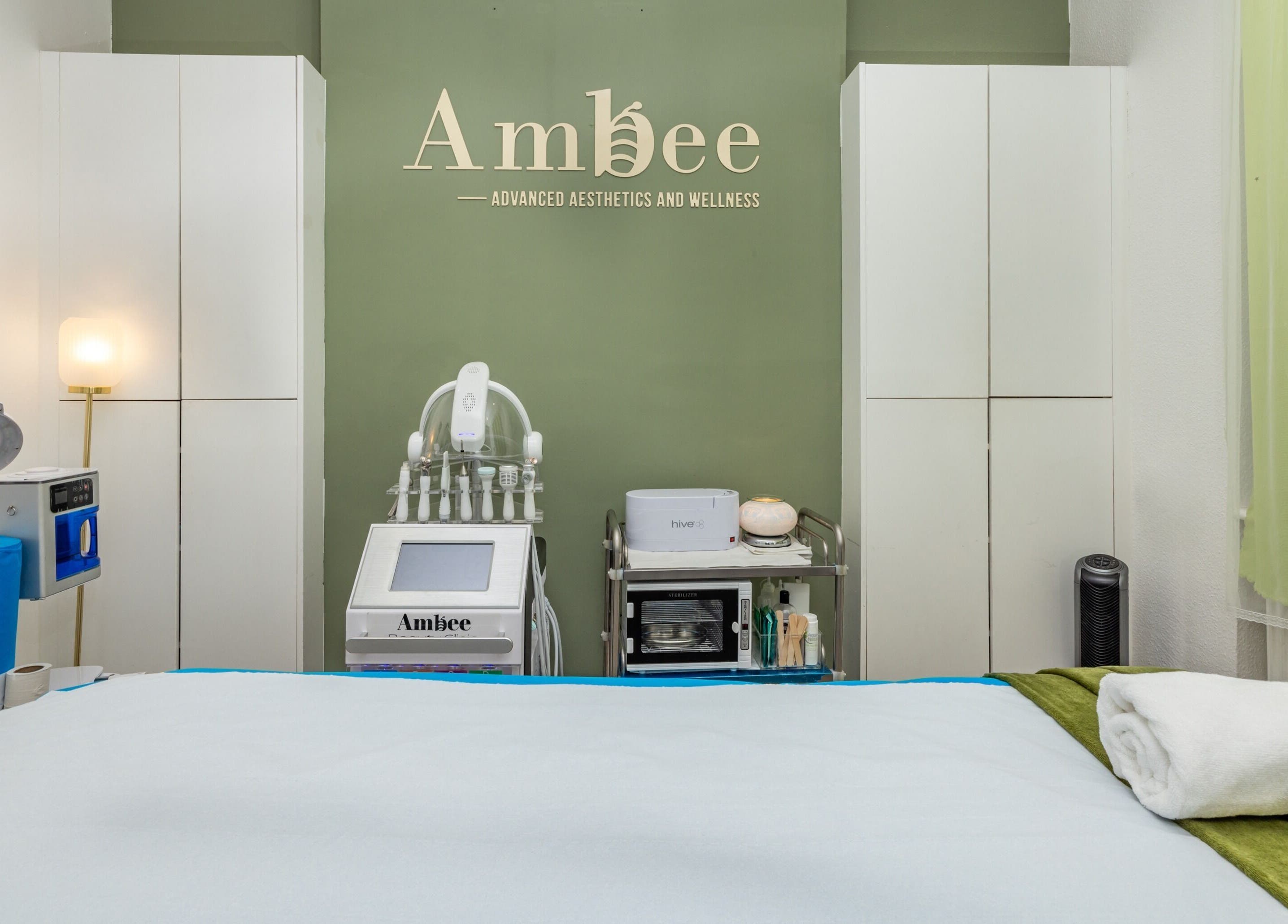 Treatment room at Fulham - Ambee Advanced Aesthetics & Wellness, London, England, GB. Modern decor and equipment.