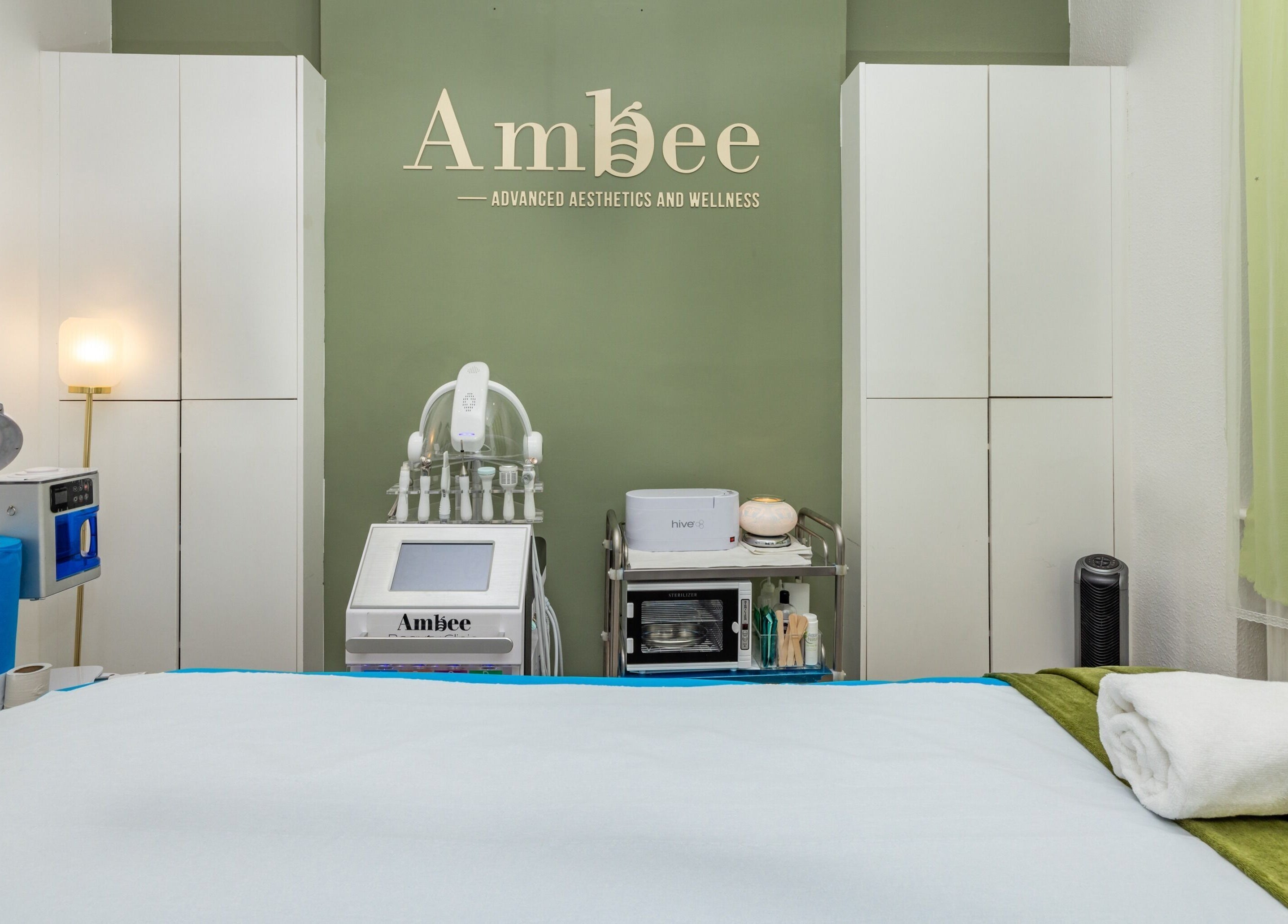 Treatment room at Fulham - Ambee Advanced Aesthetics & Wellness, London, England, GB. Modern decor and equipment.