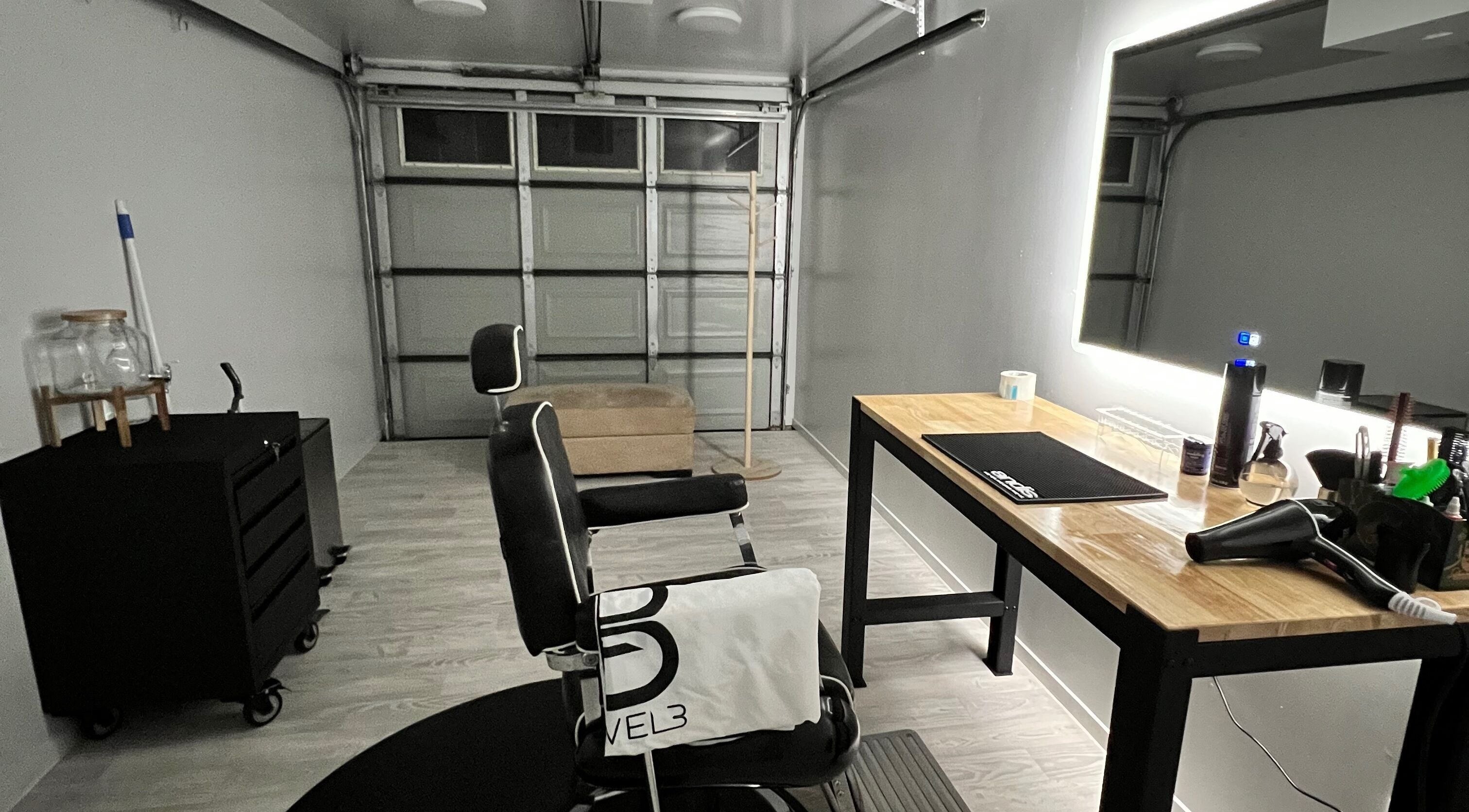 Kalsi’s Barbershop in Wellington, NZ features a stylish interior with modern barber chair and sleek decor.