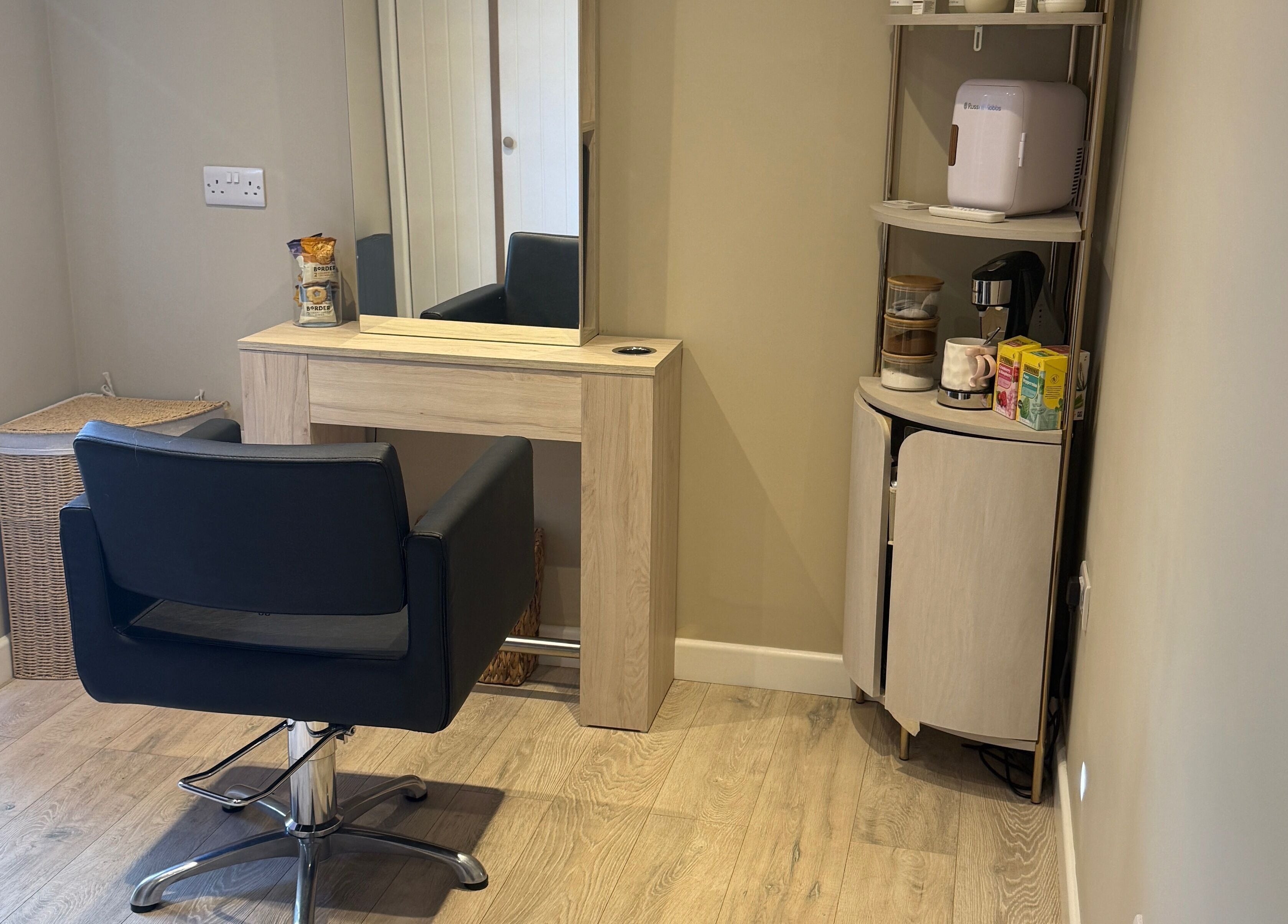 Elegant salon chair and mirror setup at The Olive Room, Newbury, England, GB. Ideal for beauty treatments.