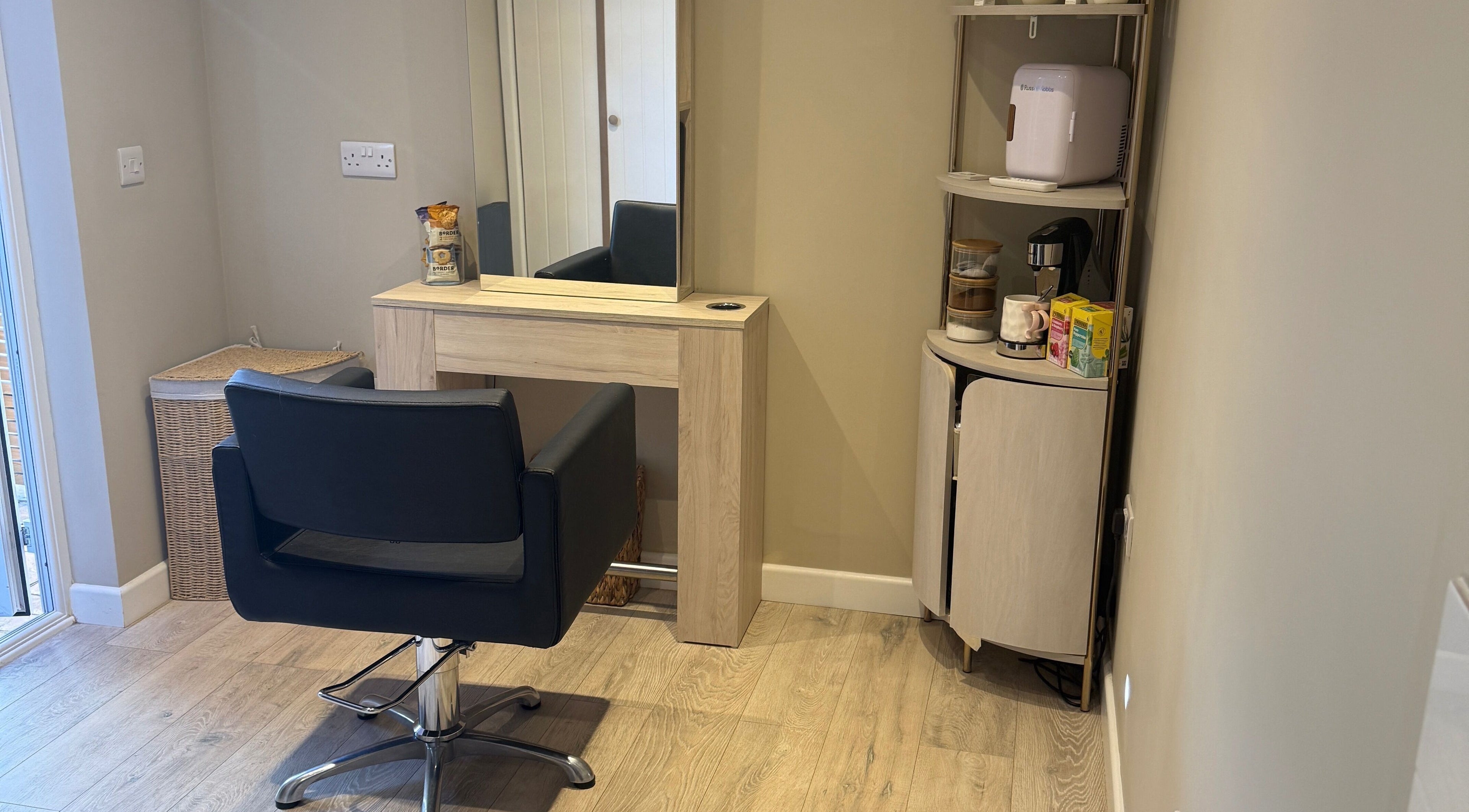 Elegant salon chair and mirror setup at The Olive Room, Newbury, England, GB. Ideal for beauty treatments.
