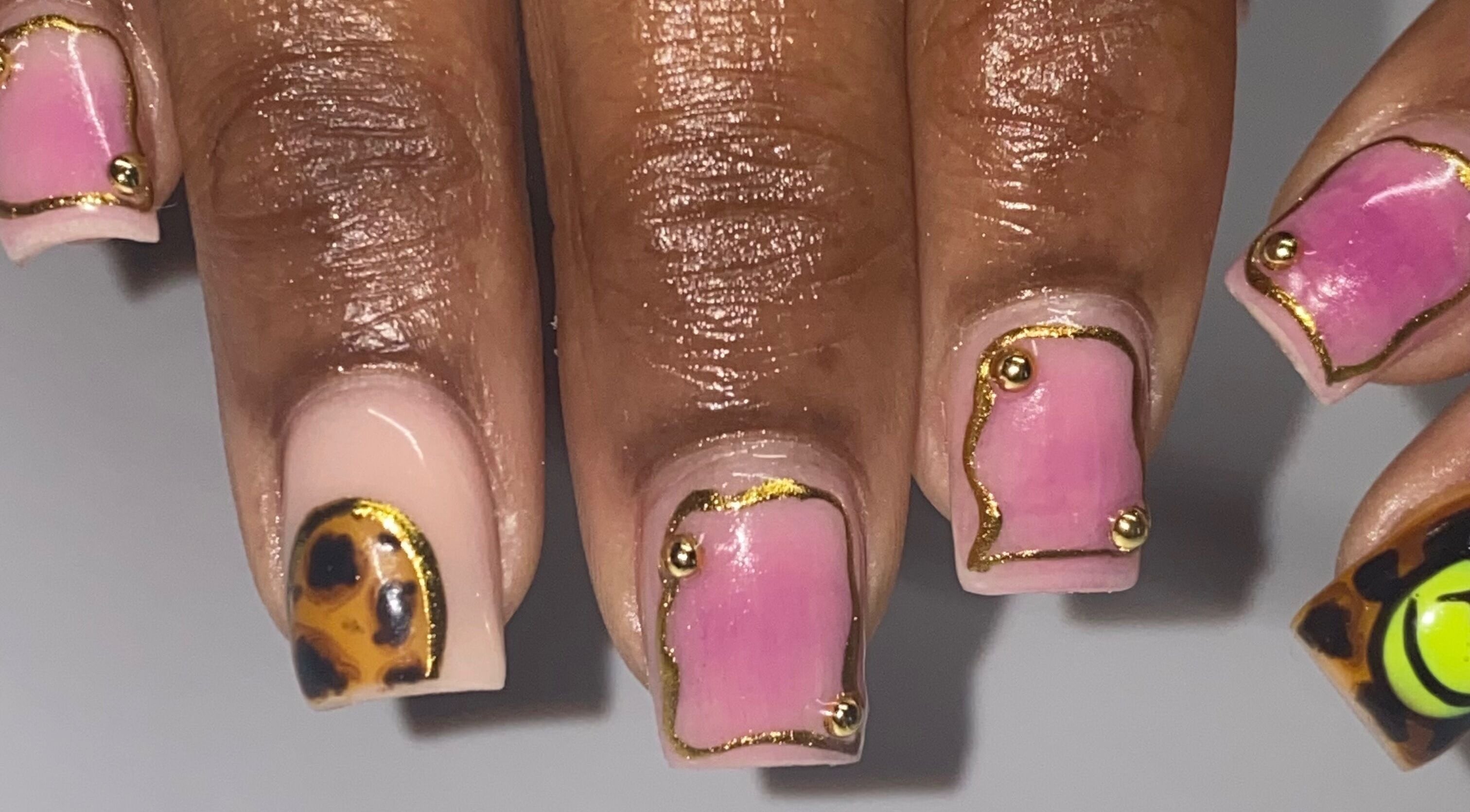 Elegant nail art with pink and leopard designs at Naild By Tee in Chicago Heights, Illinois, US.