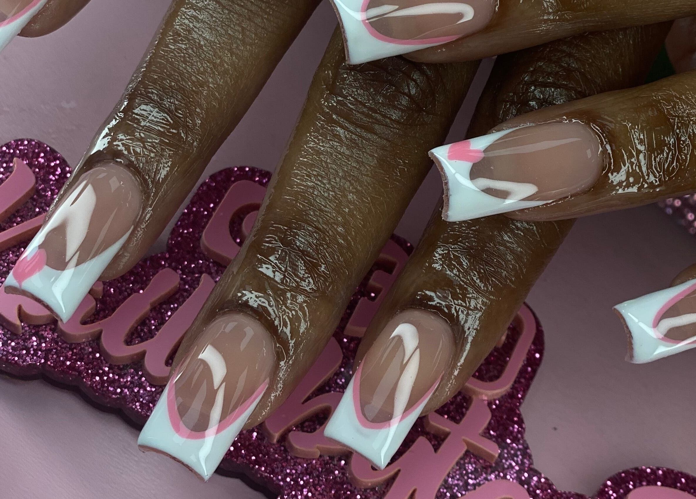 Elegant white and pink nail art at Naild By Tee, Chicago Heights, Illinois, US.