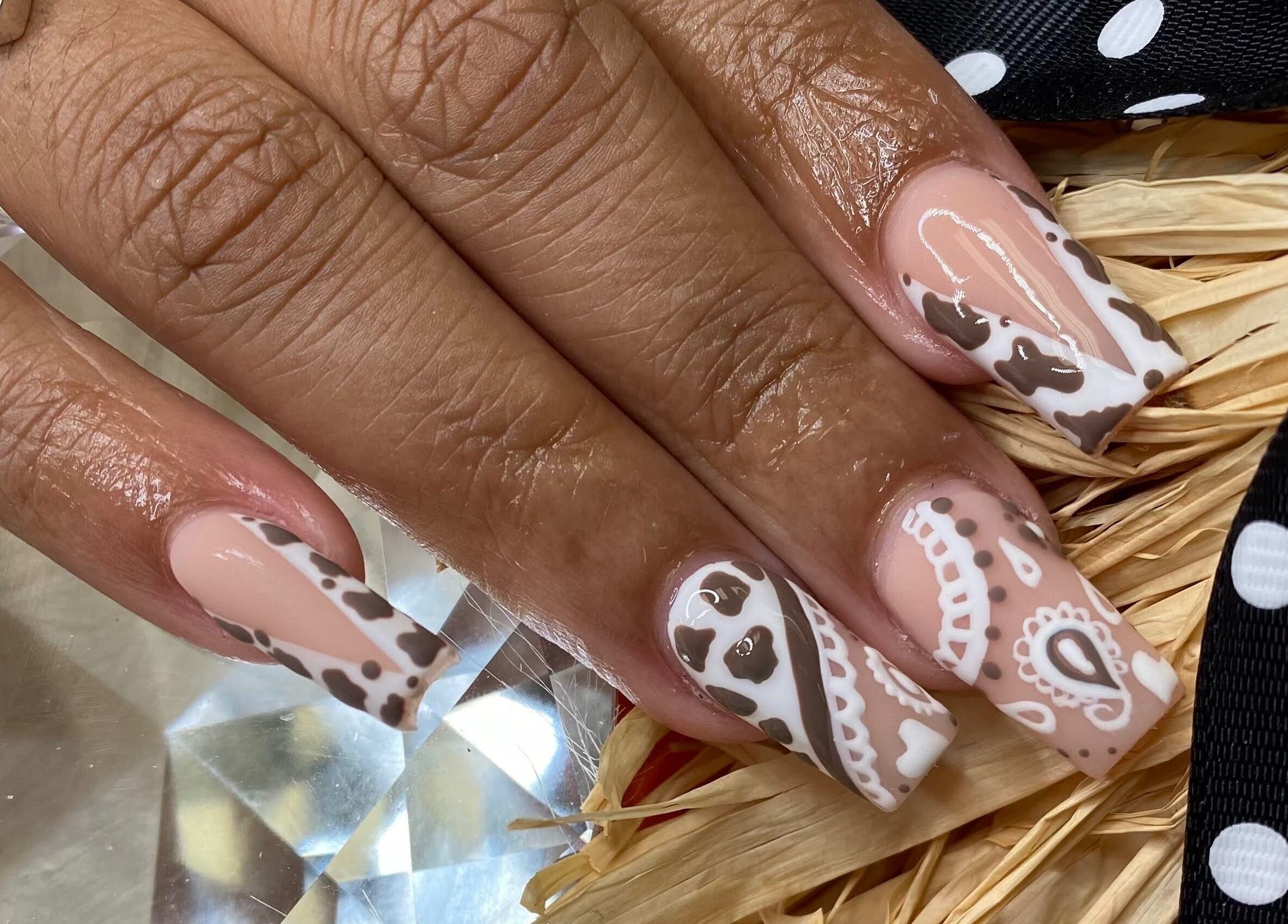 Intricate nail art design at Naild By Tee, Chicago Heights, Illinois, US.