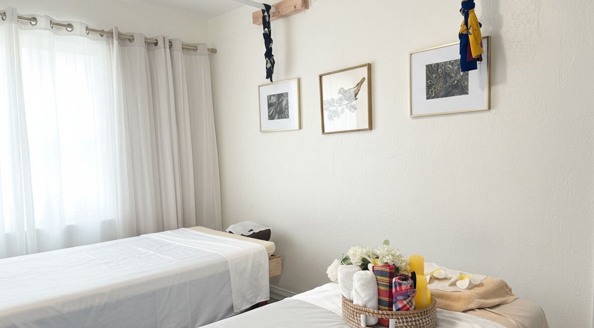Tranquil massage room at Thai House Wellness and Spa in Sacramento, California, US with calming decor.