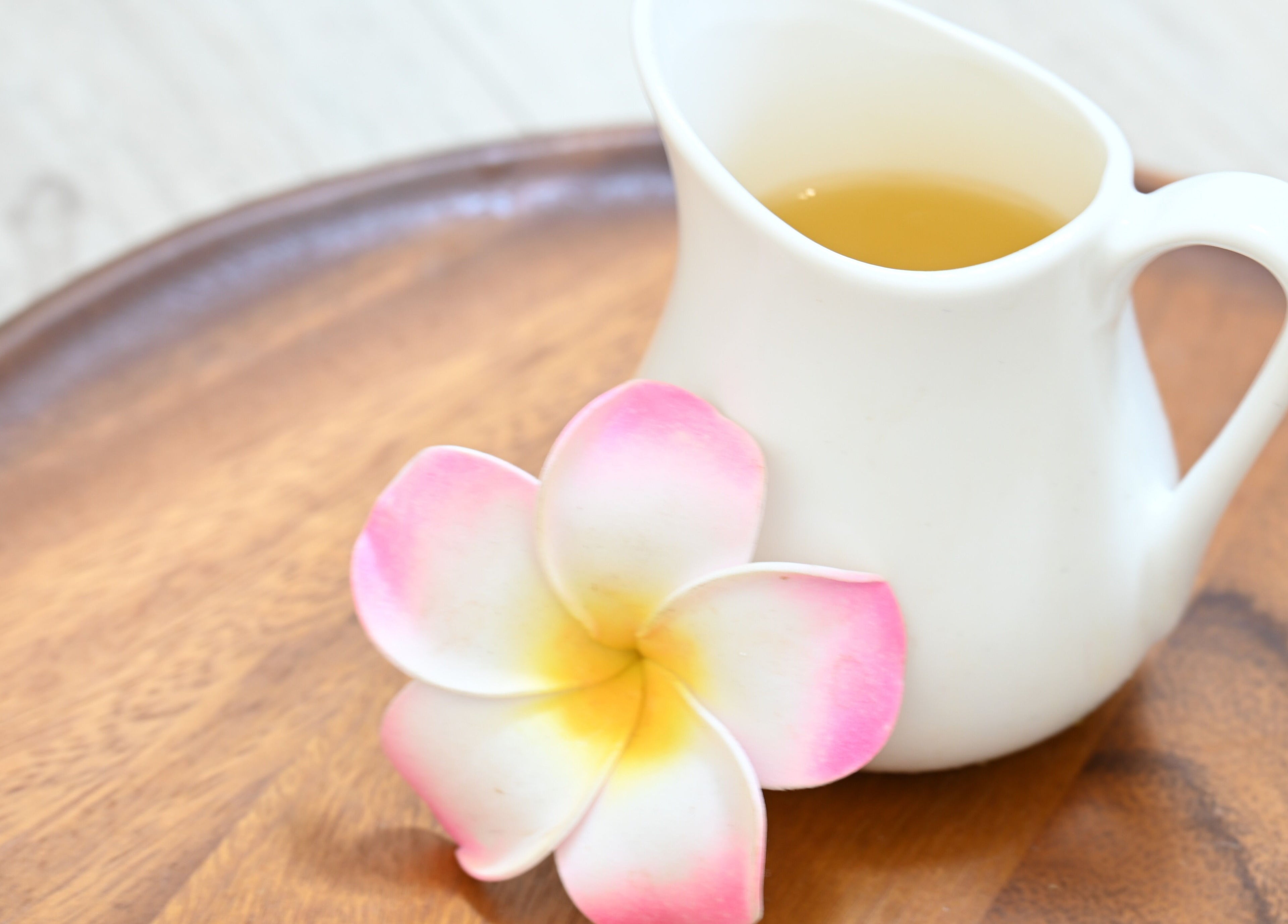 A serene flower and jug at Thai House Wellness and Spa, Sacramento, California, US.
