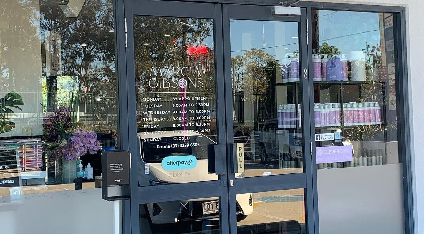 Entrance of Studio Hi Gorgeous in Alfredton, Victoria, AU featuring glass doors and wellness products.