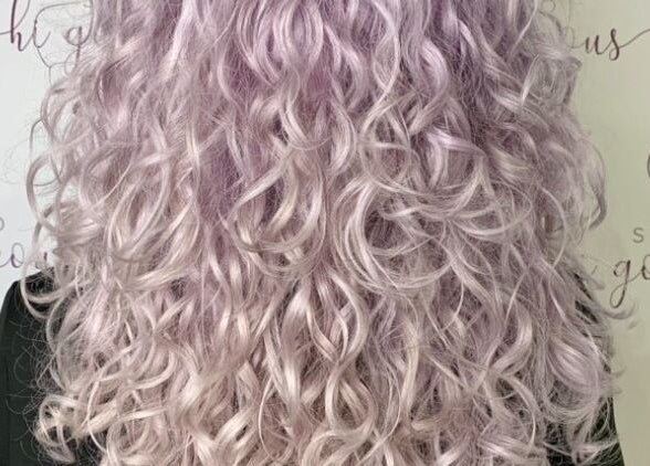 Lavender curly hairstyle at Studio Hi Gorgeous, located in Alfredton, Victoria, AU.