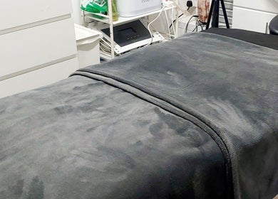 Luxurious treatment bed at Palmarys, Southampton, England, GB, ideal for beauty and wellness therapies.