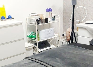 Peaceful beauty treatment room at Palmarys, Southampton, England, GB, featuring modern equipment.