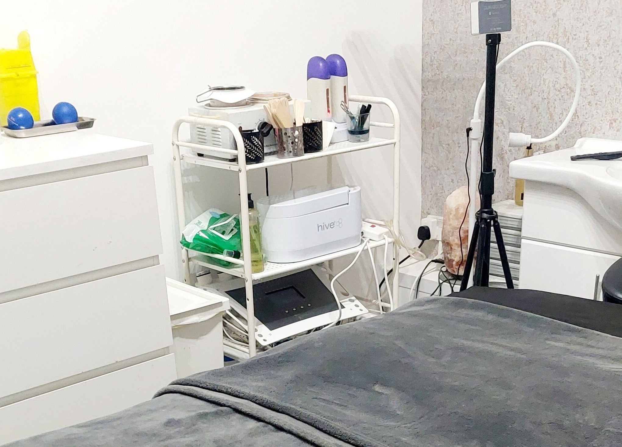 Peaceful beauty treatment room at Palmarys, Southampton, England, GB, featuring modern equipment.