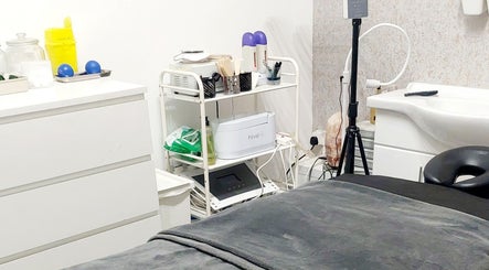 Peaceful beauty treatment room at Palmarys, Southampton, England, GB, featuring modern equipment.