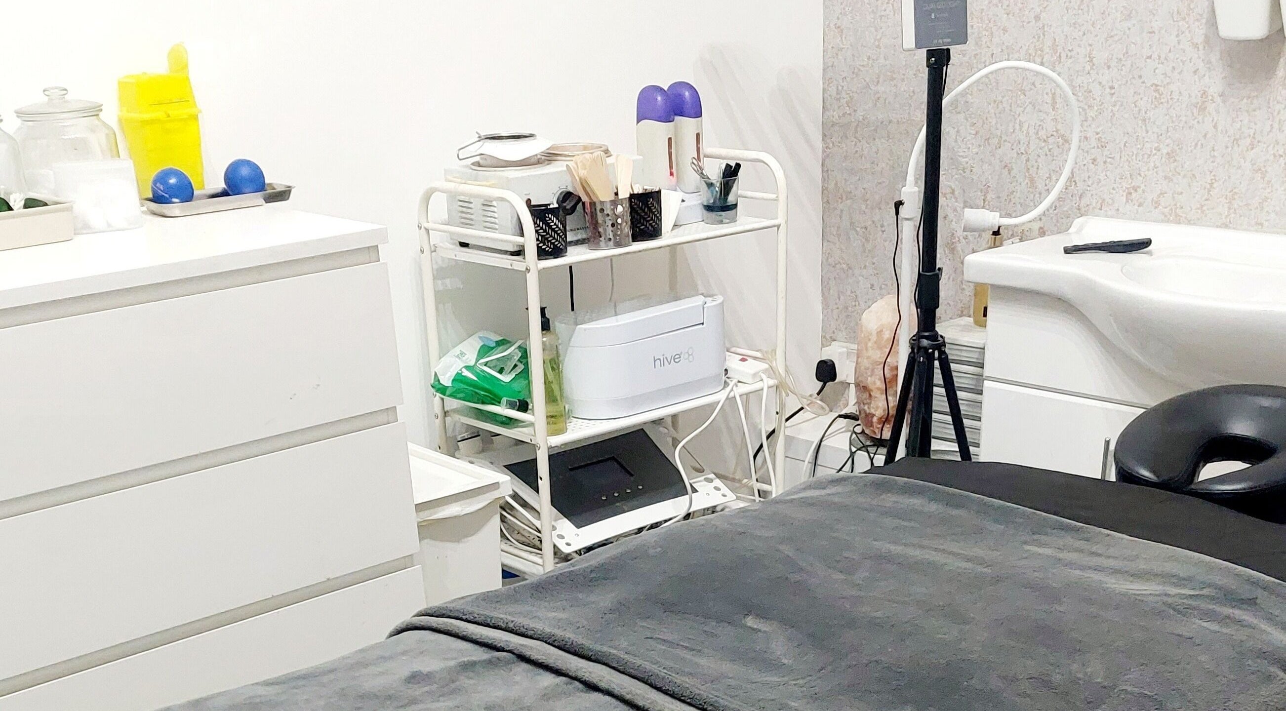 Peaceful beauty treatment room at Palmarys, Southampton, England, GB, featuring modern equipment.