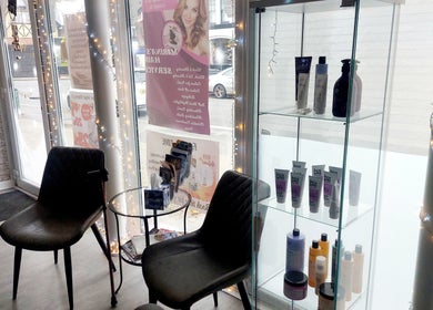 Comfortable seating and product display at Palmarys, Southampton, England, GB. Inviting beauty and wellness ambiance.